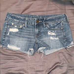 American Eagle light wash destressed denim shorts